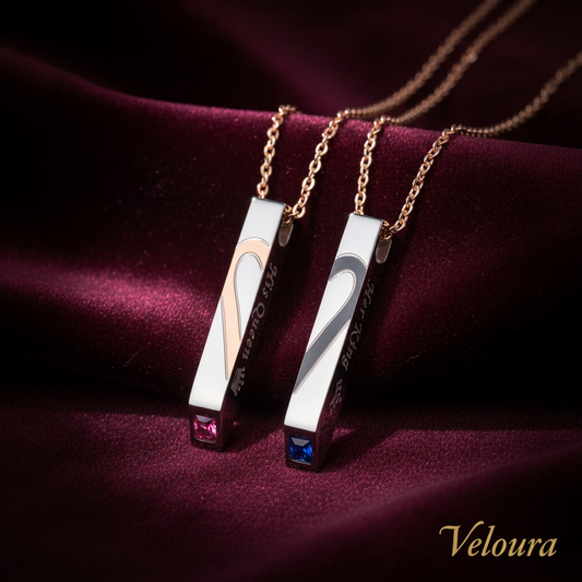 Pair of silver earrings with gemstones on a white background